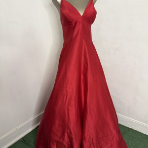 Betsey & Adams red satin, sleeveless, backless v-neck gown size 12 with hidden pockets.