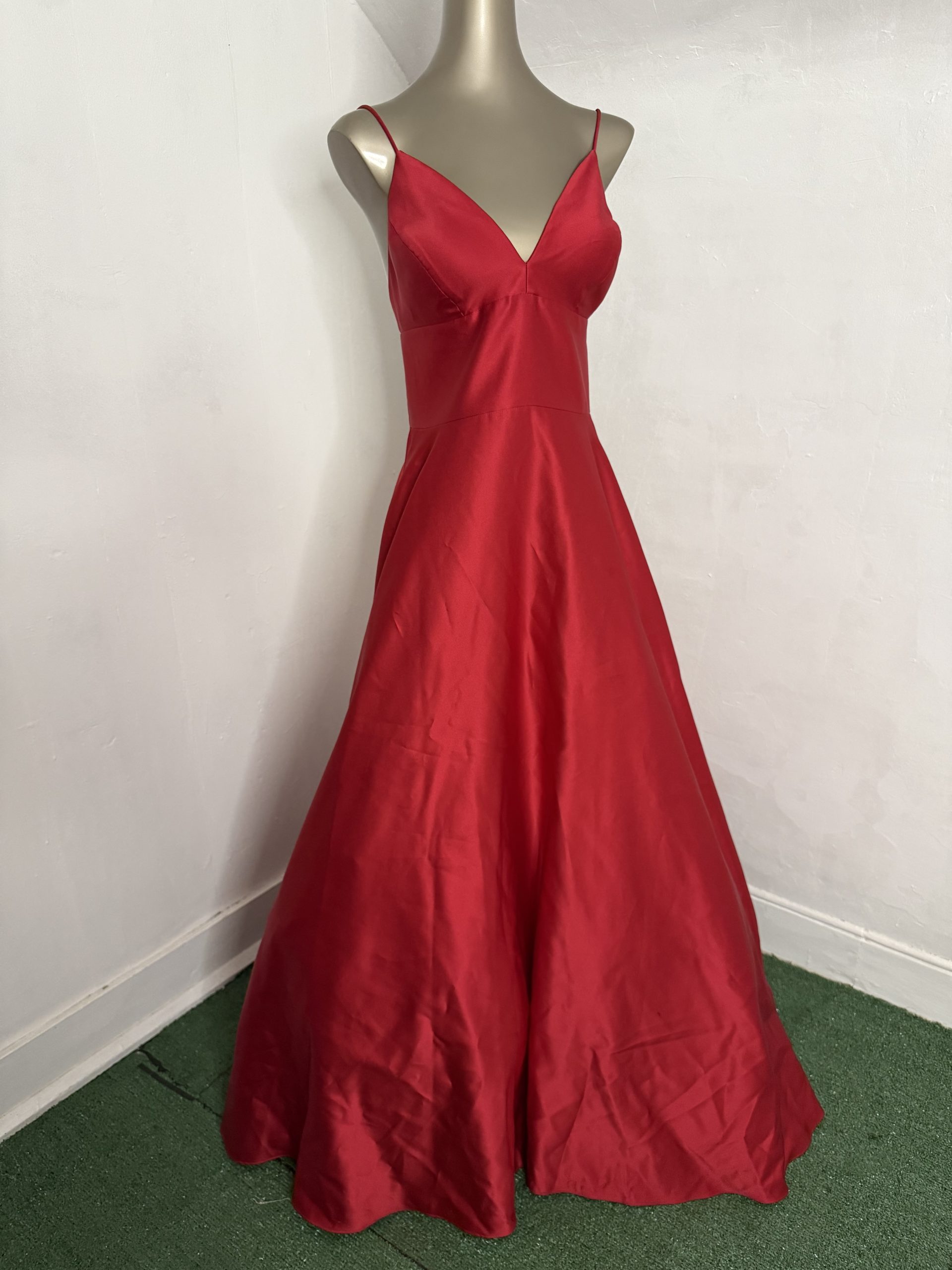 Betsey & Adams red satin, sleeveless, backless v-neck gown size 12 with hidden pockets.